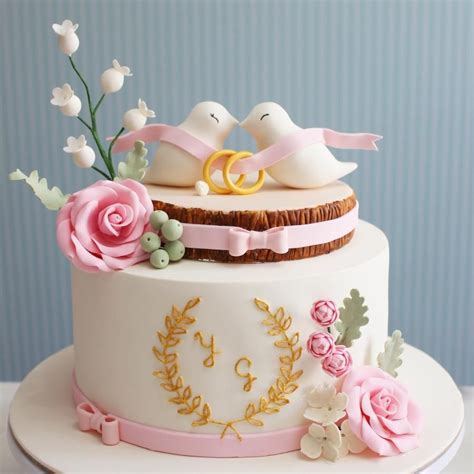 Elegant Engagement Cake with Bird and Flower Decor