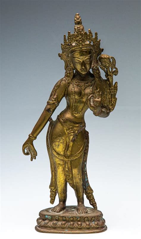 Lot Tibetan Gilt Bronze Figure Of Avalokiteshvara Standing Above A