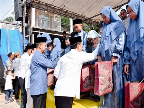 Plh Sekda Kampar Hadiri Halal Bihalal Dan Pembagian Santunan Anak