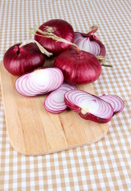 Premium Photo Fresh Red Onions On Table