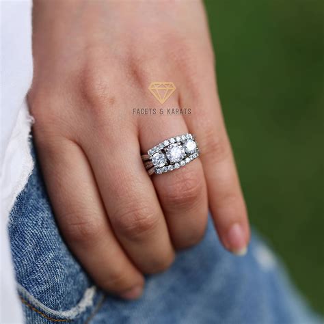 wedding band with three stone engagement ring 10