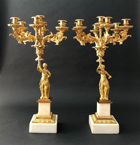 A Pair Of Classical Candelabra Charles Clark