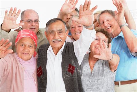 A Group Of People Waving Stock Photo Dissolve