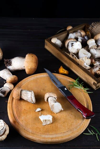 Premium Photo Button Mushrooms And Fresh Herbs