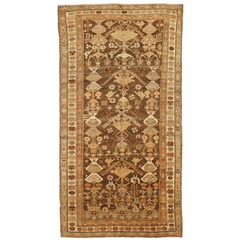 Antique Persian Shahsavan Rug With Brown And Ivory Floral Patterns For