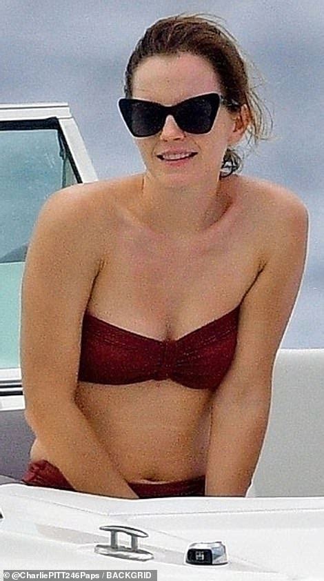 EXC Emma Watson Puts On Busty Display In A Tight Burgundy Bikini During Sun Soaked Barbados