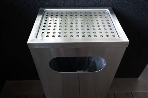 Premium Photo A Stainless Steel Dustbin With Ashtray On Top