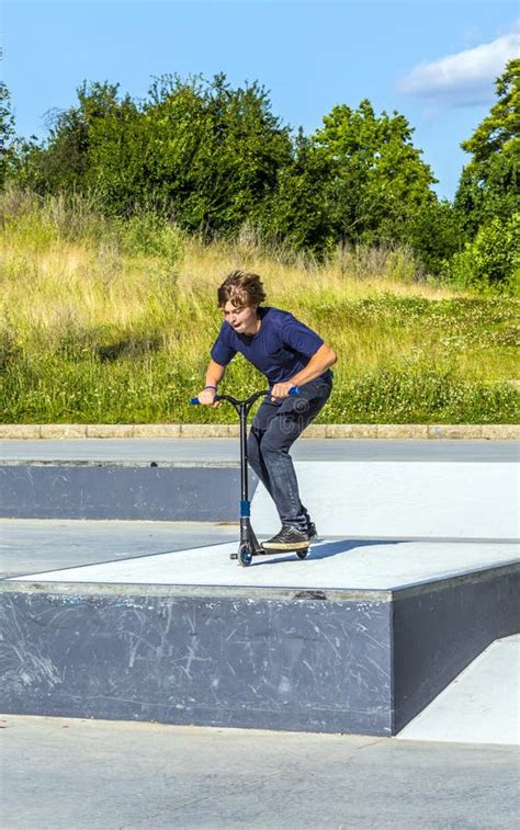 boy jumps   scooter   skate park stock image image  ride