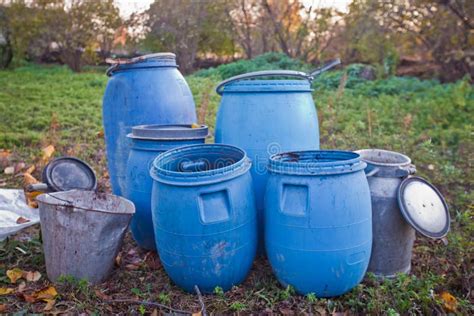 The Blue Plastic Barrels for Storage of Chemicals . Stockpile of Used ...