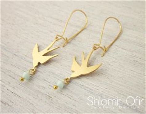 boucles d oreilles oiseau qui vole doré de Shlomit Ofir