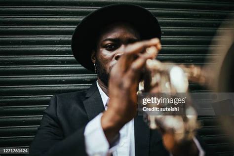 Street Trumpet Player Photos And Premium High Res Pictures Getty Images