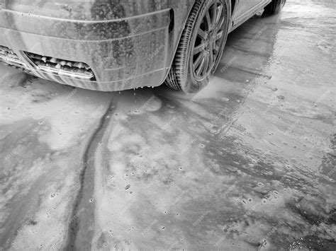 Premium Photo | Car in the foam at the car wash