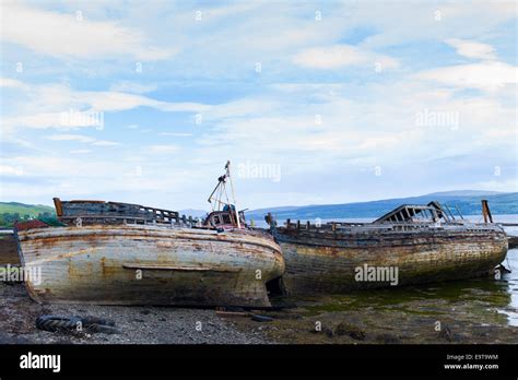 Disused Rusty Derelict Fishing Boats At Salen Bay In Sound Of Mull On