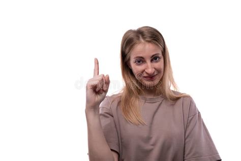 Portrait Of A Caucasian Smart 40 Year Old Woman With Flowing Blonde Hair With A Thumbs Up Stock