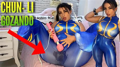 Sexy Cosplay Girl Dressed As Chun Li From Street Fighter Playing With Her Htachi Vibrator