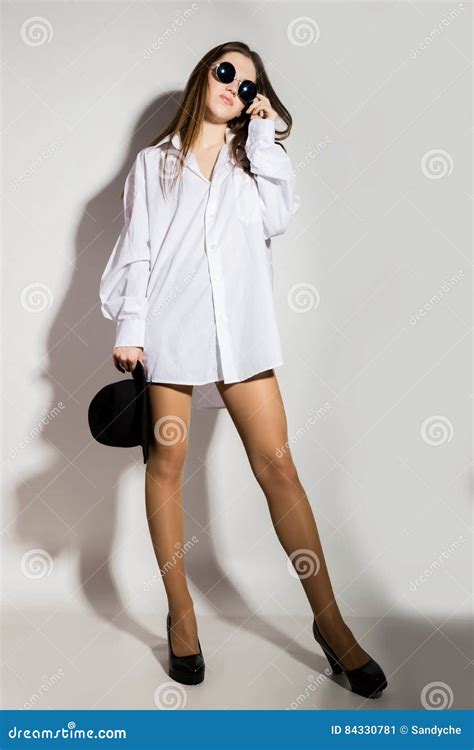 Naked Girl In A Man S White Shirt Sunglasses And Black Hat Stock Image Image Of Emotion