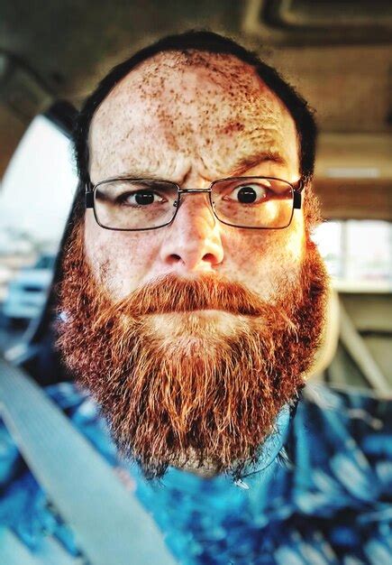 Premium Photo Portrait Of Man Sitting In Car