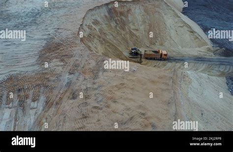 Excavator And Dumper Truck Aerial View Of Loading Sand Into A Truck A