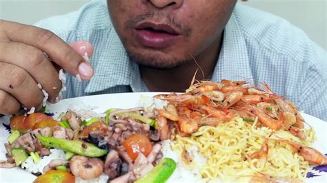 Eating Sea Food And Rice With Noodles Noodles Shrimp Squid White