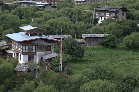 Traditional Bhutanese houses in rural village os Tiphung under Bumthang ...