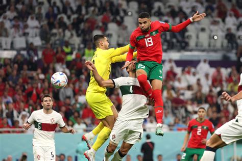 Cristiano Ronaldo puffs out his cheeks from the bench as Morocco take the lead against Portugal ...