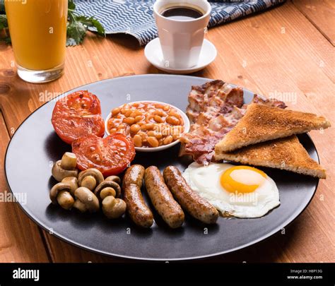 Rustic Full English Breakfast With Bacon Sausage Eggs Beans