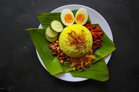 Nasi Kuning Or Yellow Rice Or Tumeric Rice Is Traditional Food From