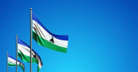 Asta De Bandera D Que Vuela Lesotho En El Cielo Azul Foto Premium