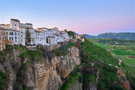 Ronda Bridge. Pink sunrise. Malaga. Spain. Photograph by Guido Montanes ...