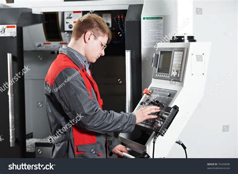 Mechanical Technician Worker At Cnc Metal Machining Milling Center In