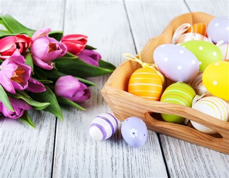 Premium Photo | Easter eggs and tulips