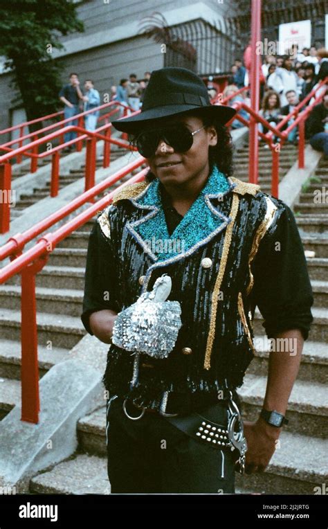 Audience gather outside the Wembley arena prior to the Michael Jackson ...