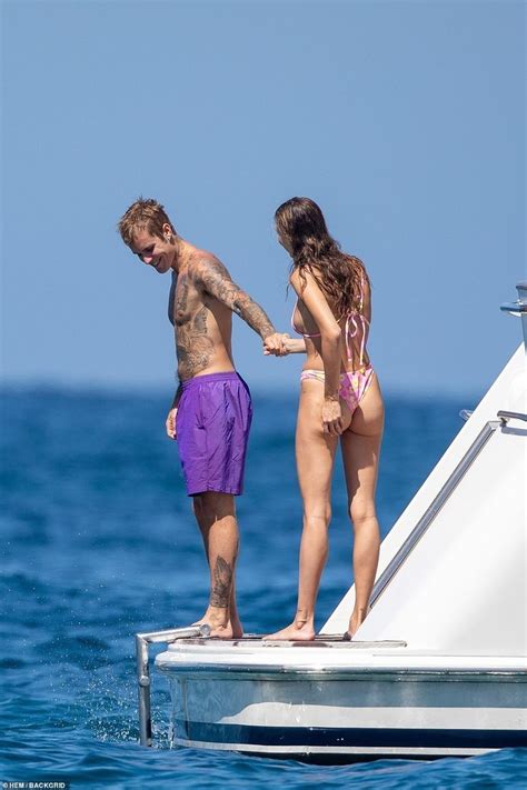 Justin Bieber Ditches The Shirt As He Embraces Bikini Clad Wife Hailey