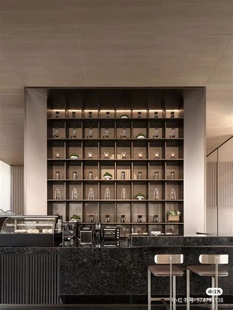 An Empty Restaurant With Marble Counter Tops And Bar Stools In Front Of