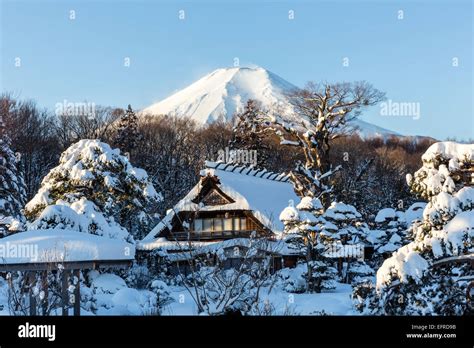 Buildings and mount fuji covered with snow hi-res stock photography and ...