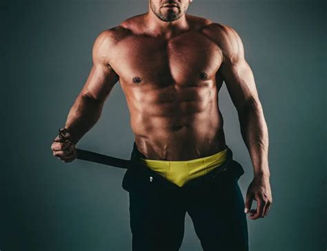 Man Takes Off His Pants Sexy Portrait Of A Very Muscular Male Model In Underwear Naked Man
