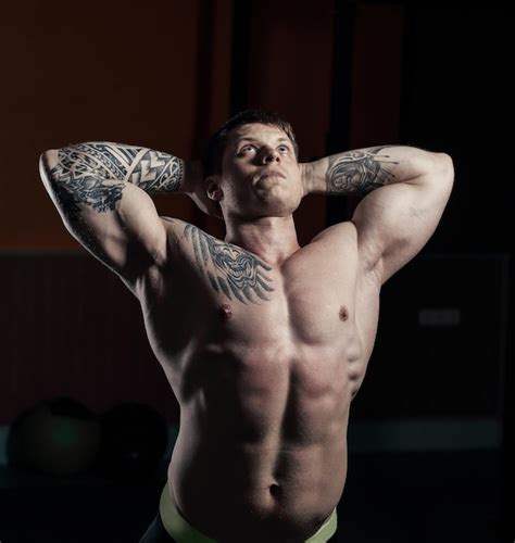 Premium Photo Muscular Bodybuilder Handsome Men Doing Exercises In Gym Naked Torso Fitness And
