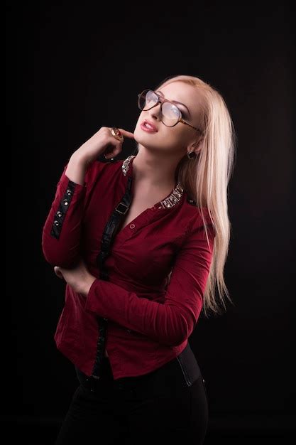 Premium Photo Glorious Blonde Model Wearing Glasses And Dressed In Red Blouse