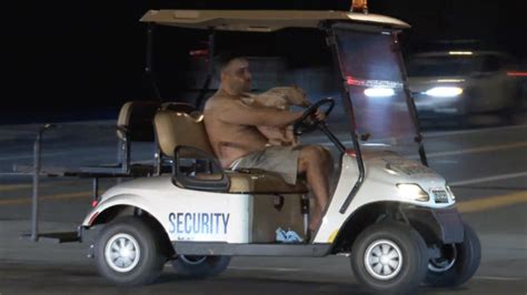 Shirtless Man With Dog In Lap Leads 15 Mph Golf Cart Police Chase For