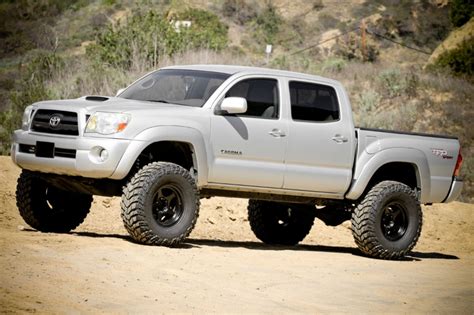 Silver toyota tacoma black wheels