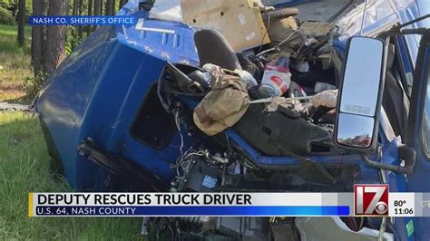 Deputy Pulls Driver Out Of Smoking Wrecked Tractor Trailer On Us 64 In