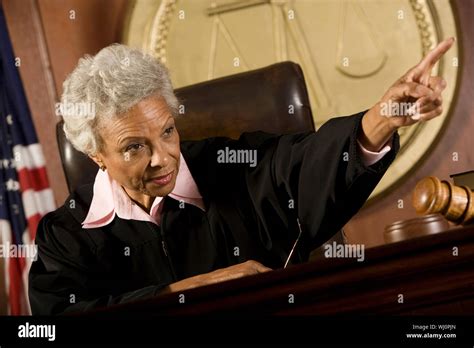 Female Judge Giving Order In Court Stock Photo Alamy