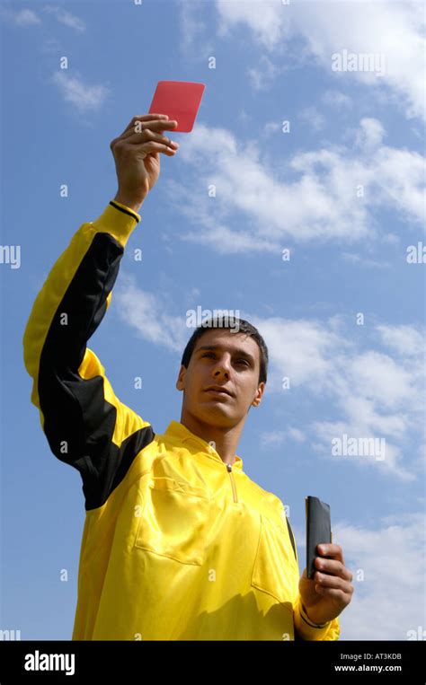 Referee showing red card Stock Photo - Alamy