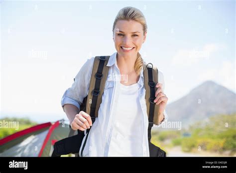 Attractive Hiking Blonde Smiling At Camera Stock Photo Alamy