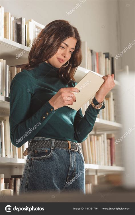 Beautiful Girl Reading Book Library Stock Photo by ©IgorVetushko 181321746