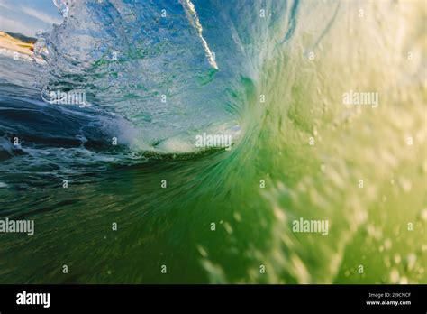 Perfect surfing swell breaking in ocean Stock Photo - Alamy