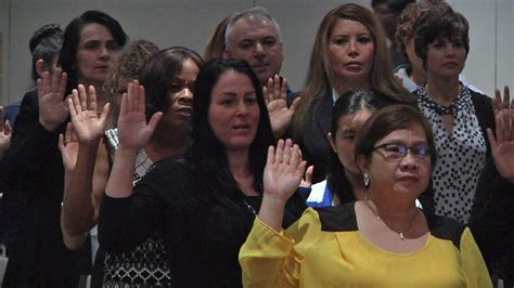 Naturalization ceremony welcomes 33 new citizens