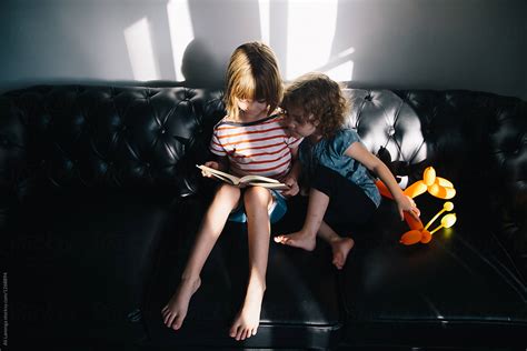 Reading Together By Stocksy Contributor Ali Lanenga Stocksy