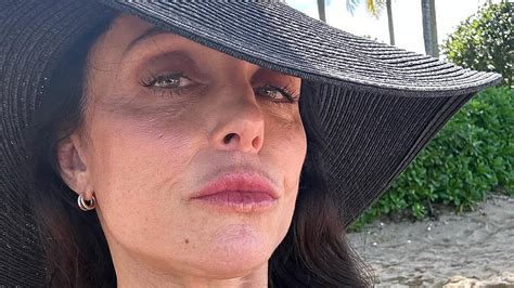 Bethenny Frankel 53 Flashes Her Side Boob As She Sports Stylish Swimsuits While Rolling