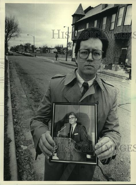 1986 Michael Plaisted Milwaukee Attorney Holds Photo Of His Father